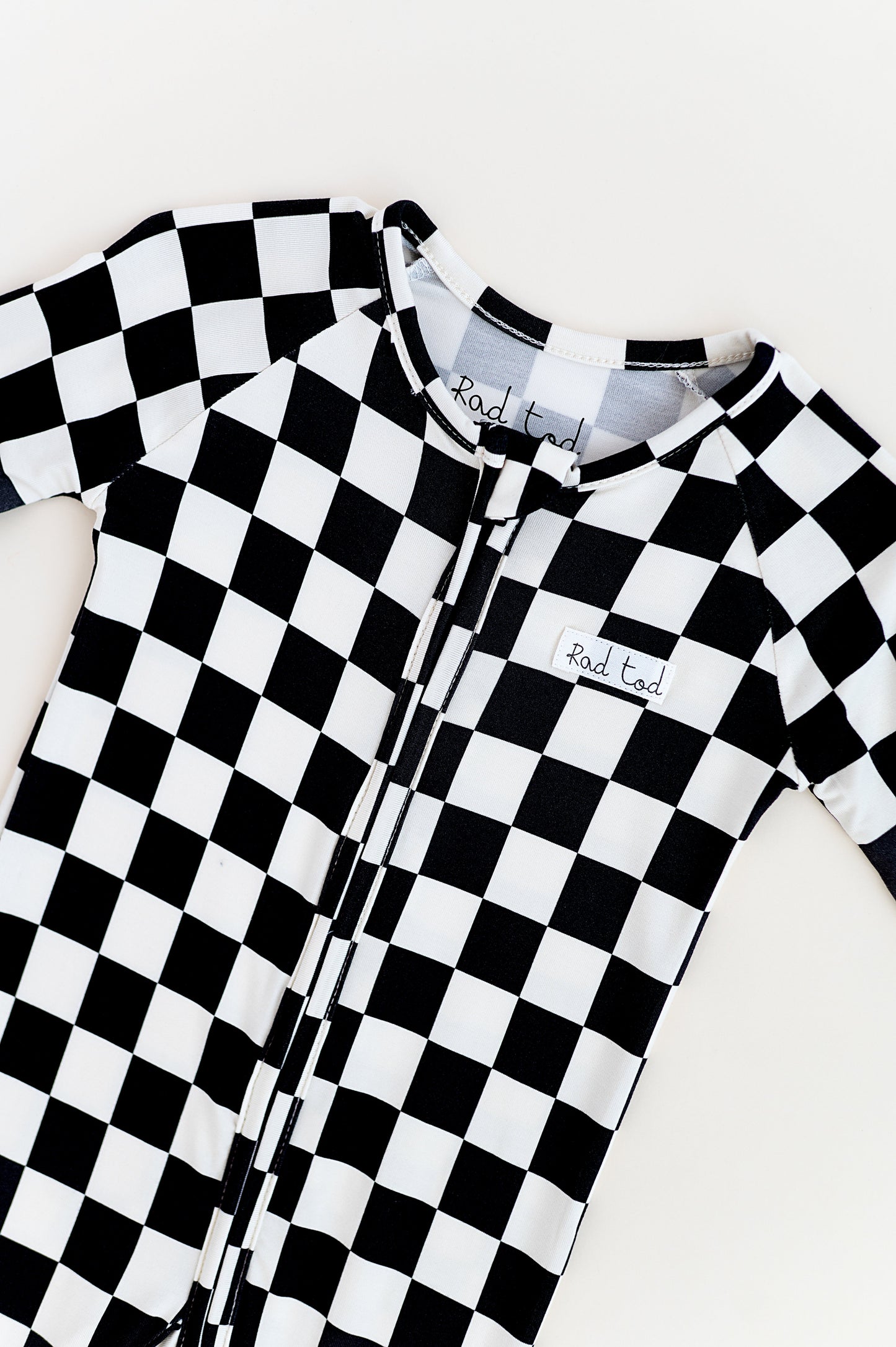 BLACK CHECKERED BAMBOO ONESIE