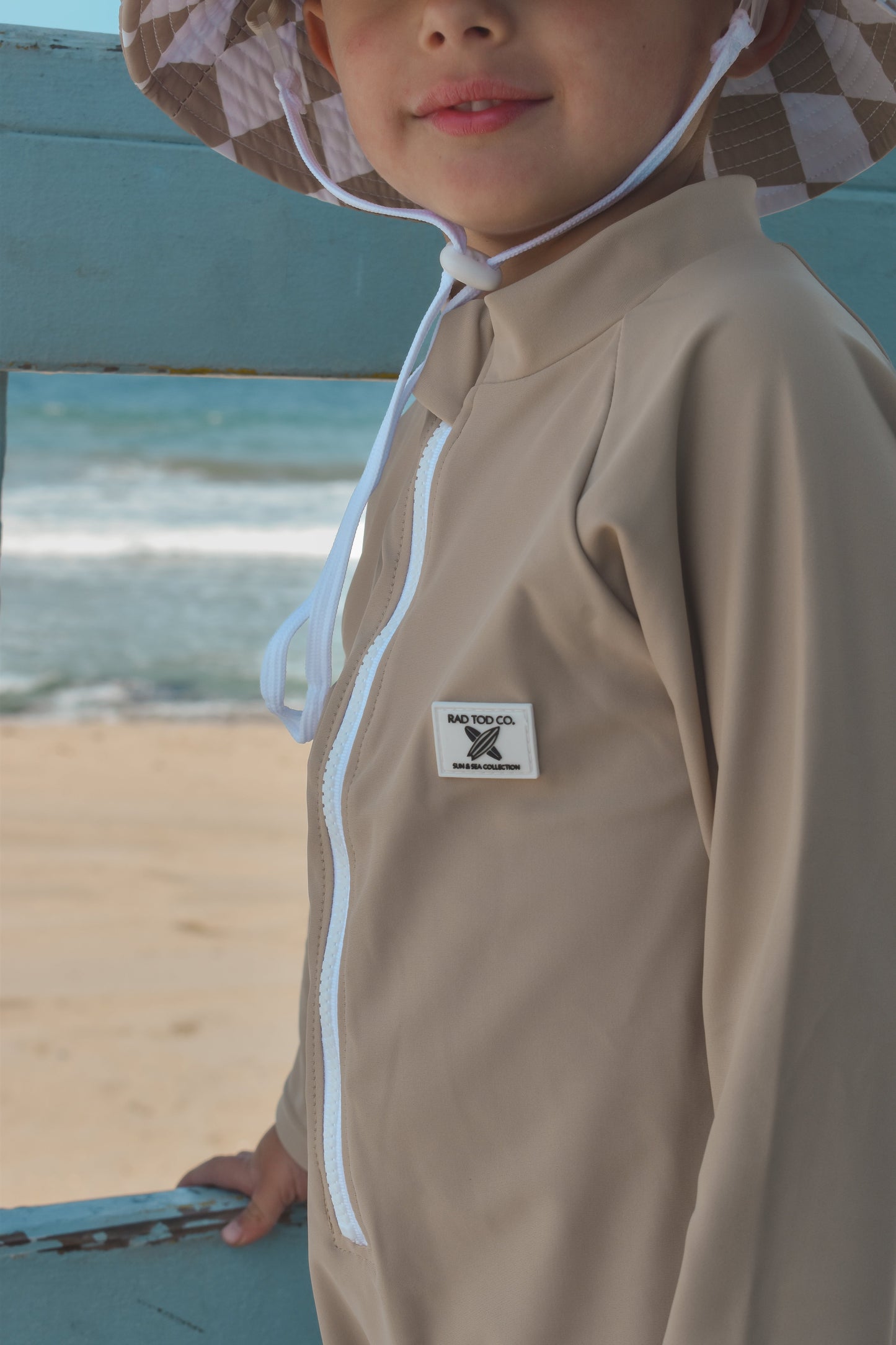 UPF 50 RASHGUARD ONESIE - LATTE