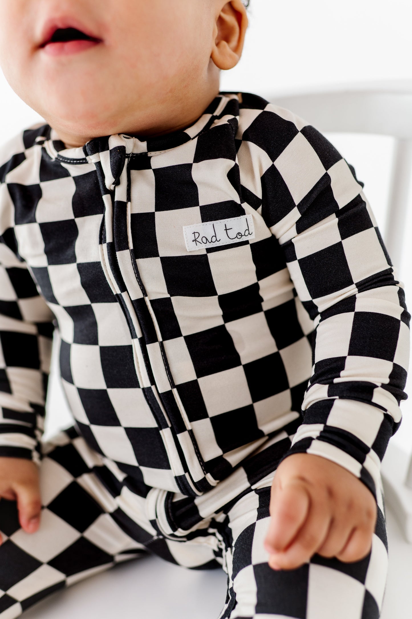 BLACK CHECKERED BAMBOO ONESIE