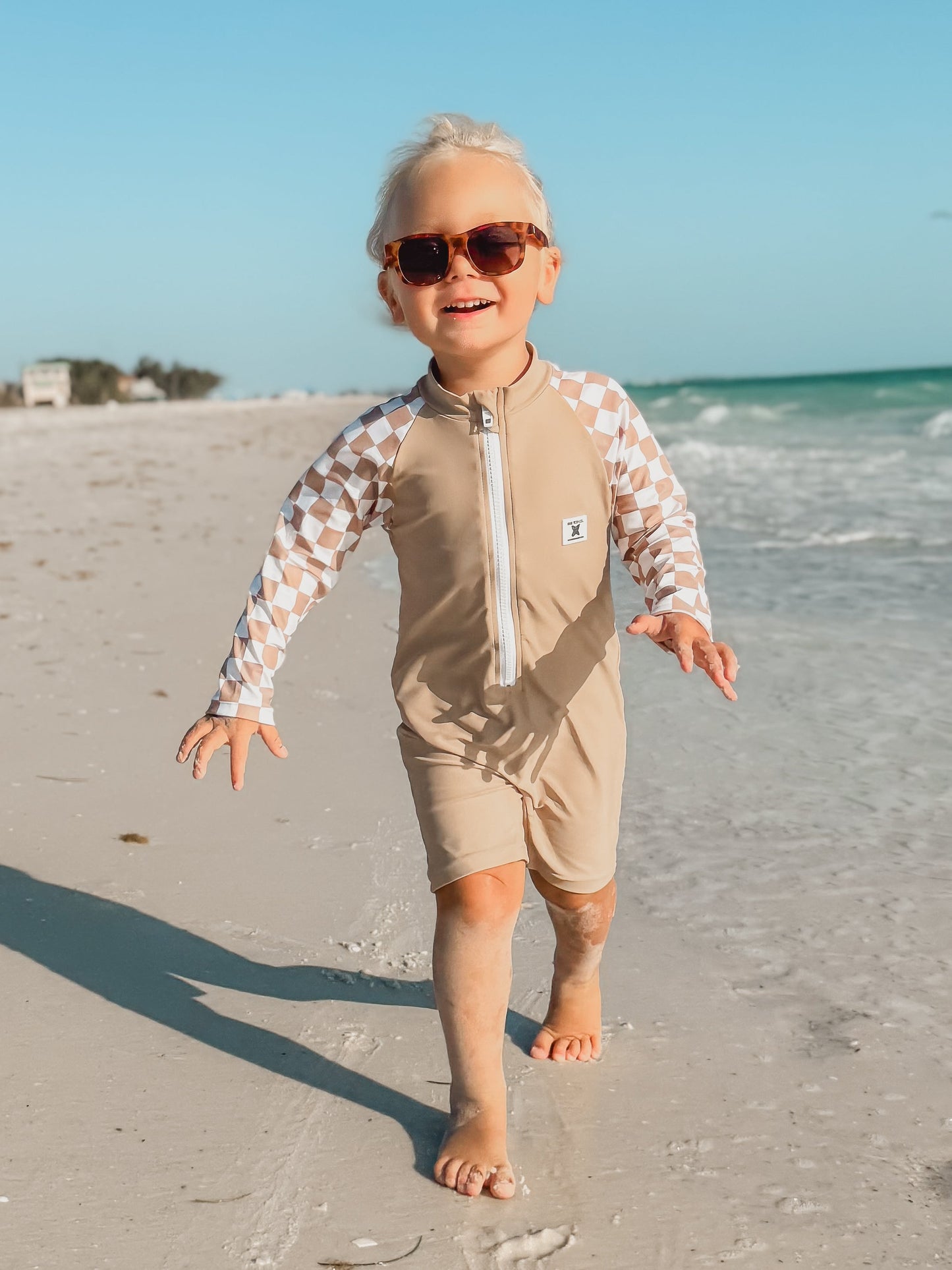 UPF 50 RASHGUARD ONESIE - DUNE CHECKERS